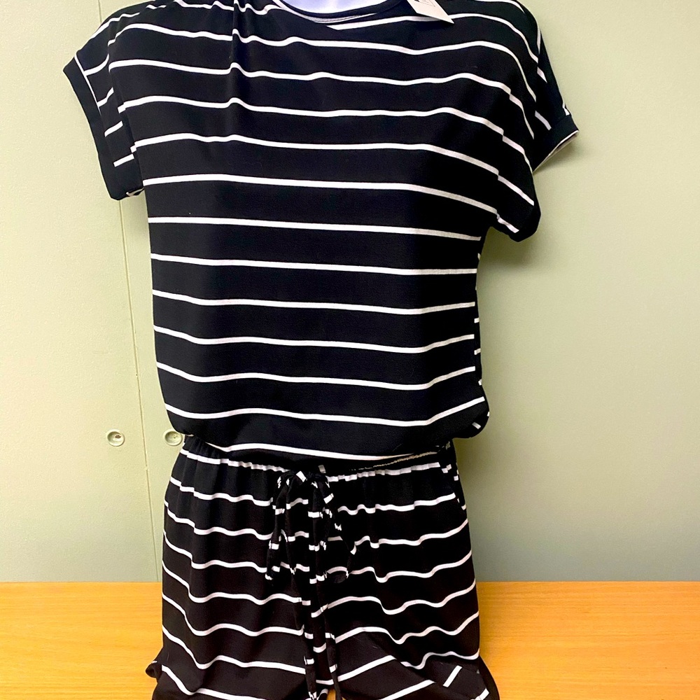 Romper. Never worn with tags.